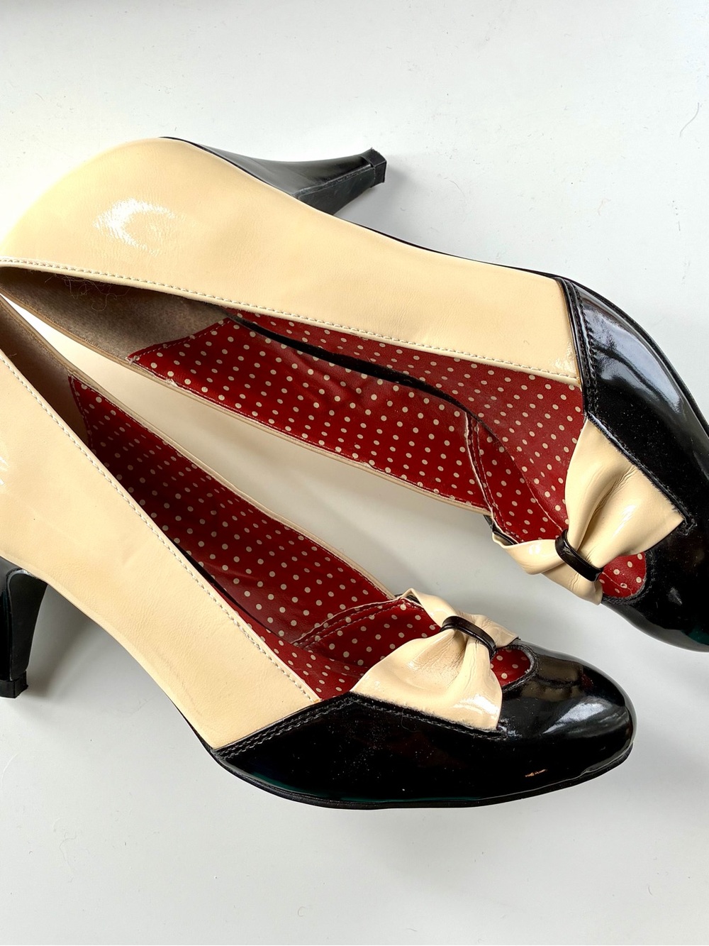 Two-Tone Cream & Black Patent Bow-Trim Pumps B.A.I.T. But Another Innocent Tale